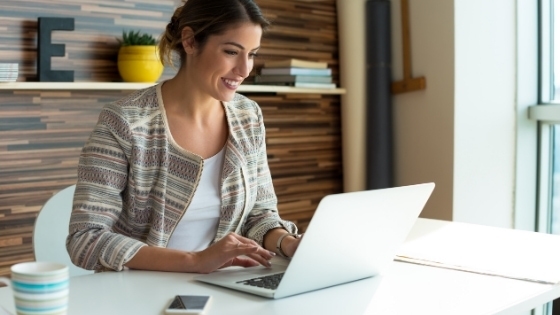 woman sitting at laptop