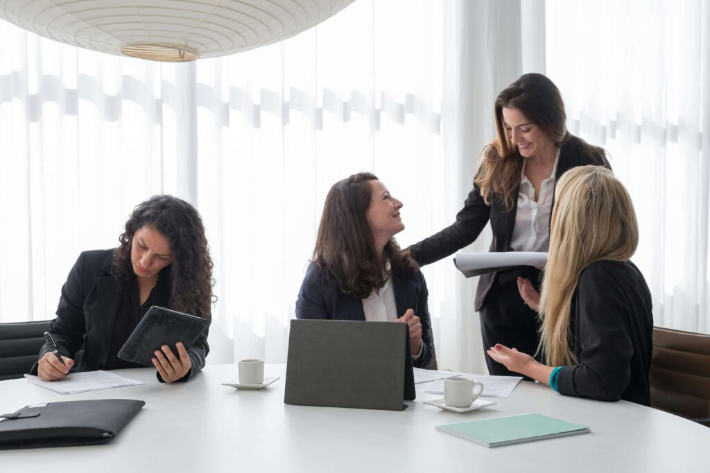 group of women sitting in an office during a training session